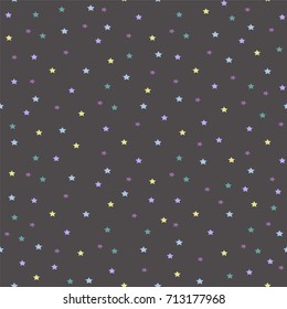 dark seamless pattern with small colorful stars. magic print for kids textile,package or wrapping paper.