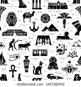 Dark seamless pattern of symbols, landmarks, and signs of Egypt from icons in a flat style.