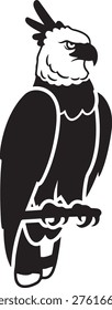 Dark silhouette of harpy eagle perched regally. Majestic bird symbolizing strength and royalty.