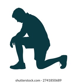 A dark silhouette of a man kneeling in a posture of contemplation