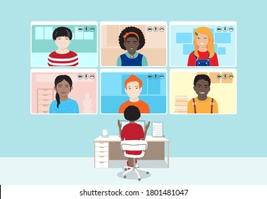 Dark skin female teacher at the workplace, laptop, students screens, remote lesson for young school children, video conference app. Distance school, online education safety during coronavirus pandemic