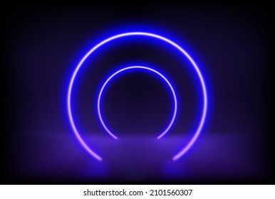 Dark stage with blue neon glowing arc