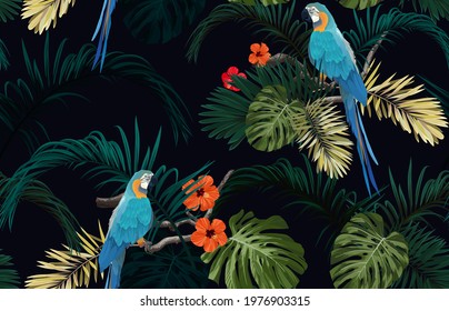 Dark tropical seamless pattern with exotic monstera and royal palm leaves, hibiscus flowers, blue macaws and branches. Vector illustration.