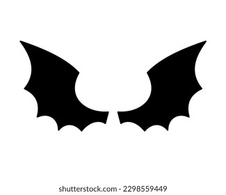 silueta de ala oscura diablo en las sombras de las alas de murciélago asustado en la noche de Halloween.