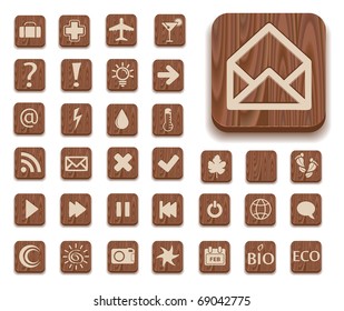 dark wooden icon set with different signs - mail, rss, question, bulb, arrow, eco, approve mark