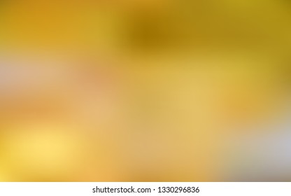Dark Yellow vector colorful blur backdrop. Modern abstract illustration with gradient. New design for your business.