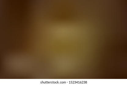 Dark Yellow vector glossy abstract background. Glitter abstract illustration with gradient design. New style for your business design.