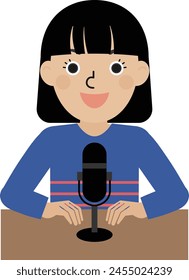 A dark-haired Japanese woman wearing long-sleeved clothes talking into a stand microphone in front of a desk