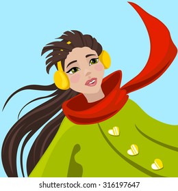 Dark-haired model with yellow winter earmuffs and red scarf.
