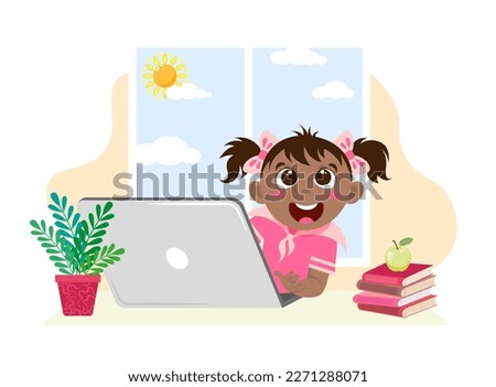 Сheerful dark-haired swarthy girl at a table and a laptop is studying online on a white background with a window