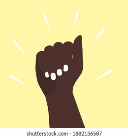 The dark-skinned hand is raised up. The hand is clenched into a fist in protest. A symbol of the African, African American peace movement for empowerment. Vector illustration. Hand isolated on yellow