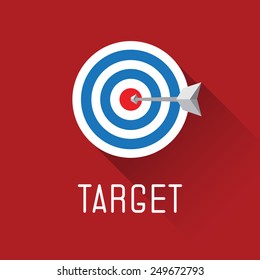 A dart is in the center of a dartboard. target concept