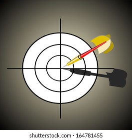 Dart hitting the center mark on target