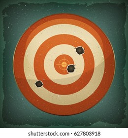 Dart Target With Bullets Shot/
Illustration of a grunge red and white dart targets with bullets shot