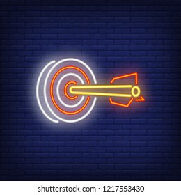 Dart in target neon sign. Illustration of dart in rad target on dark blue brick background. Can be used for topics like entertainment, games, advertisement