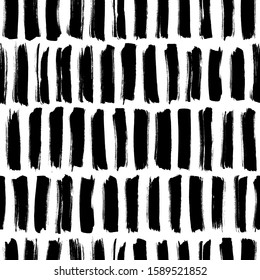 Dash grunge vector seamless pattern. Hand drawn vertical brush strokes texture. Black painted lines, stripes or smears. Black and white mess mosaic texture. Regular geometric lines seamless pattern.