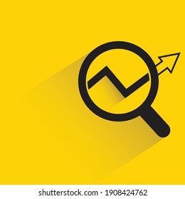 data analytics and graph, magnifeir glass drop shadow on yellow background