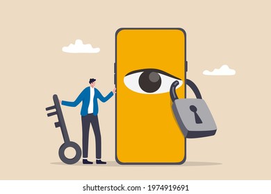 Data privacy for internet user, protect application to track or follow user behavior concept, man holding key after lock the spy eye on smartphone to stop watching private information.