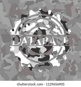 Database written on a grey camouflage texture
