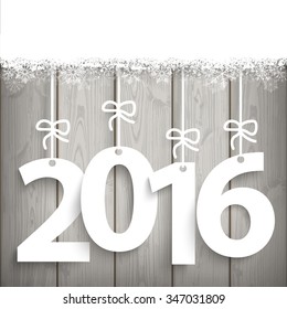 Date 2016 on the wooden background. Eps 10 vector file.