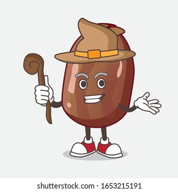 Date Palm Fruit cartoon mascot character as a witch on the stage