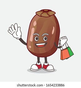 Date Palm Fruit cartoon mascot character waving and holding Shopping bag