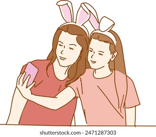 hija con madre tomando selfie de pascua