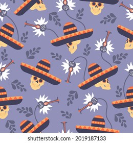 Day of the dead pattern with skulls in big hats and flowers on a blue background
