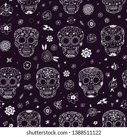 Day of the Dead. Seamless vector pattern with skulls and flowers on dark background. 