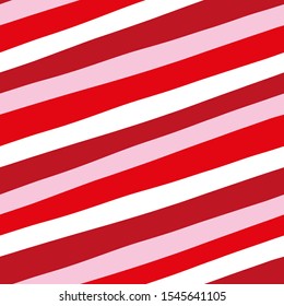 Valentine’s day wrapping stripe seamless pattern with red, pink and white diagonal lines.