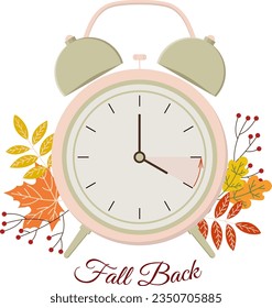 Concepto de horario de verano. Reloj de alarma con hojas de otoño. Retroceda el tiempo.	