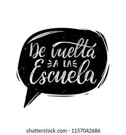 De Vuelta A La Escuela, vector hand lettering. Translation from Spanish to English of phrase Back To School. Calligraphic inscription in speech bubble.