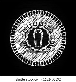 dead man in his coffin icon drawn on blackboard