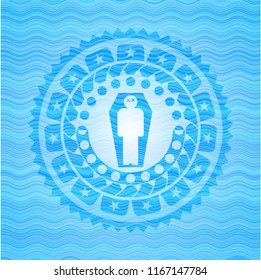 dead man in his coffin icon inside water representation badge background.