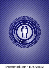 dead man in his coffin icon inside badge with denim texture