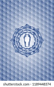 dead man in his coffin icon inside blue emblem with geometric background.
