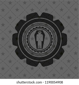 dead man in his coffin icon inside dark badge or emblem