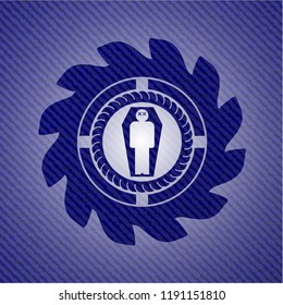 dead man in his coffin icon inside jean or denim emblem or badge background