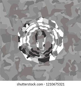 dead man in his coffin icon on grey camouflage pattern
