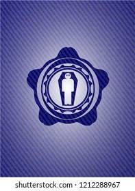 dead man in his coffin icon inside emblem with jean background