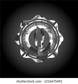 dead man in his coffin icon on grey camo pattern