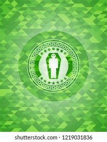 dead man in his coffin icon inside green emblem with triangle mosaic background