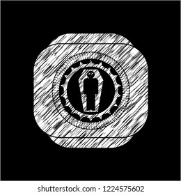dead man in his coffin icon inside chalk emblem written on a blackboard