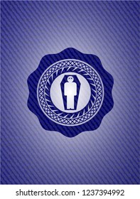 dead man in his coffin icon inside emblem with denim texture