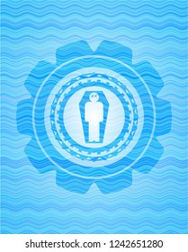 dead man in his coffin icon inside water concept style badge.