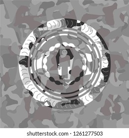 dead man in his coffin icon on grey camo texture
