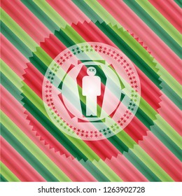 dead man in his coffin icon inside christmas style emblem.