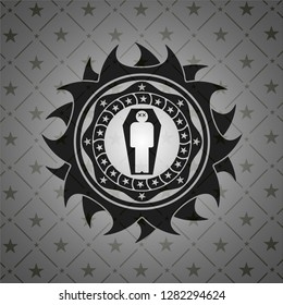 dead man in his coffin icon inside black badge