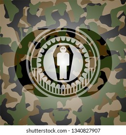 dead man in his coffin icon inside camouflage emblem