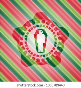 dead man in his coffin icon inside christmas colors badge.